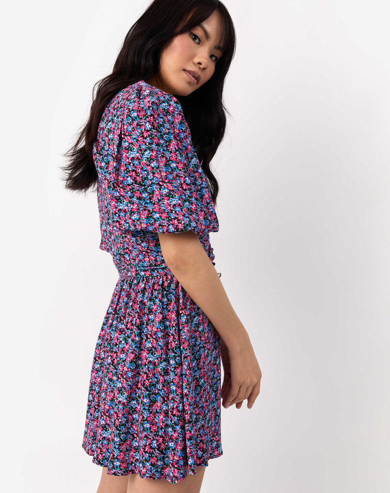 model looks away from the camera while wearing the Sasha Multi Floral Dress