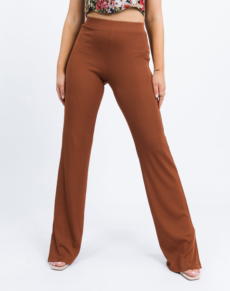 the model stands straight showing a cropped in shot of the Lana Wide Leg Trousers in Chocolate Rib